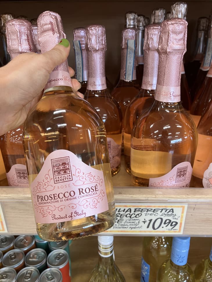 rose wine bottles on shelf in trader joes