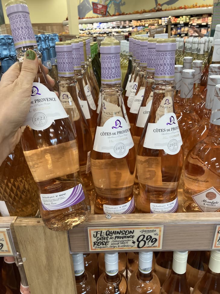rose wine bottles on shelf in trader joes