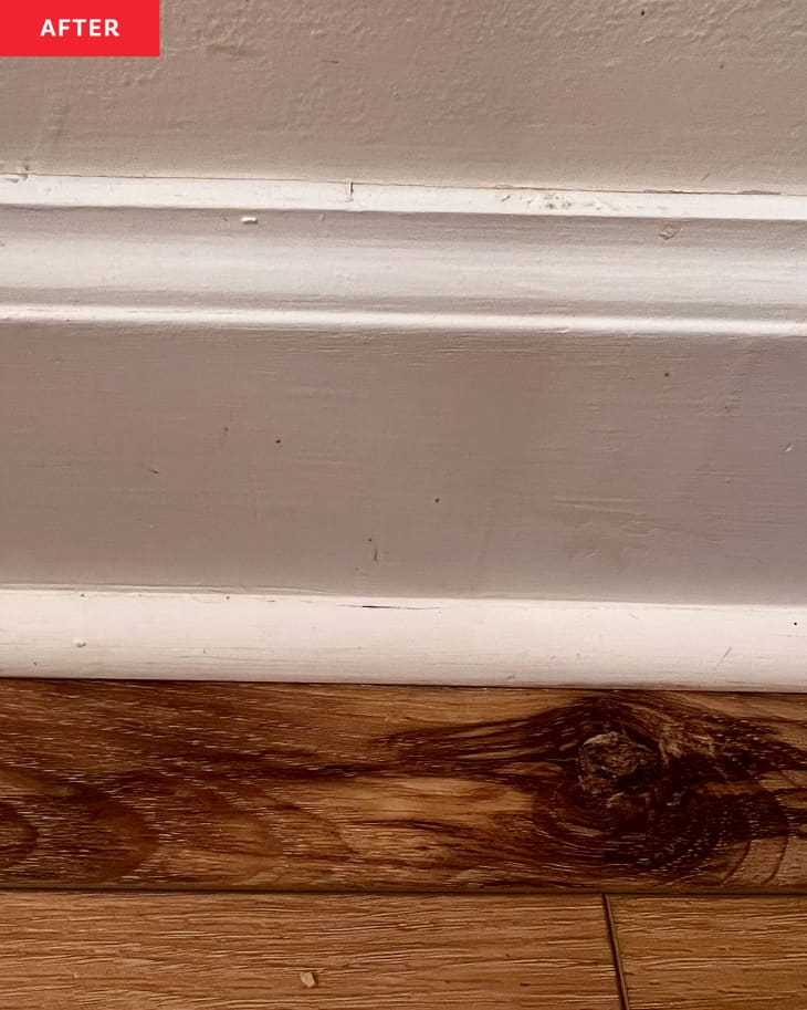 Baseboard after being cleaned with baseboard cleaning hack.