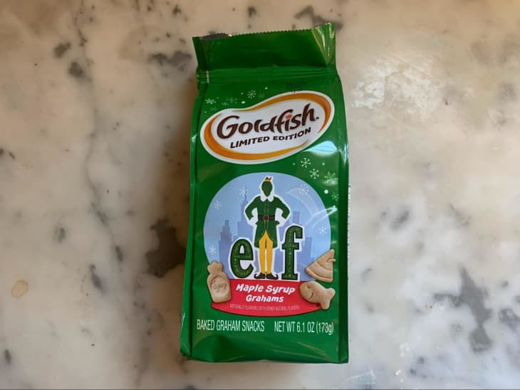 green bag of goldfish with elf illustration on front and pictures of graham gold fish