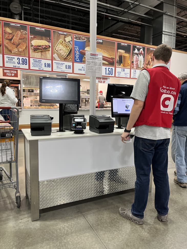 An employee at a Costco food court.