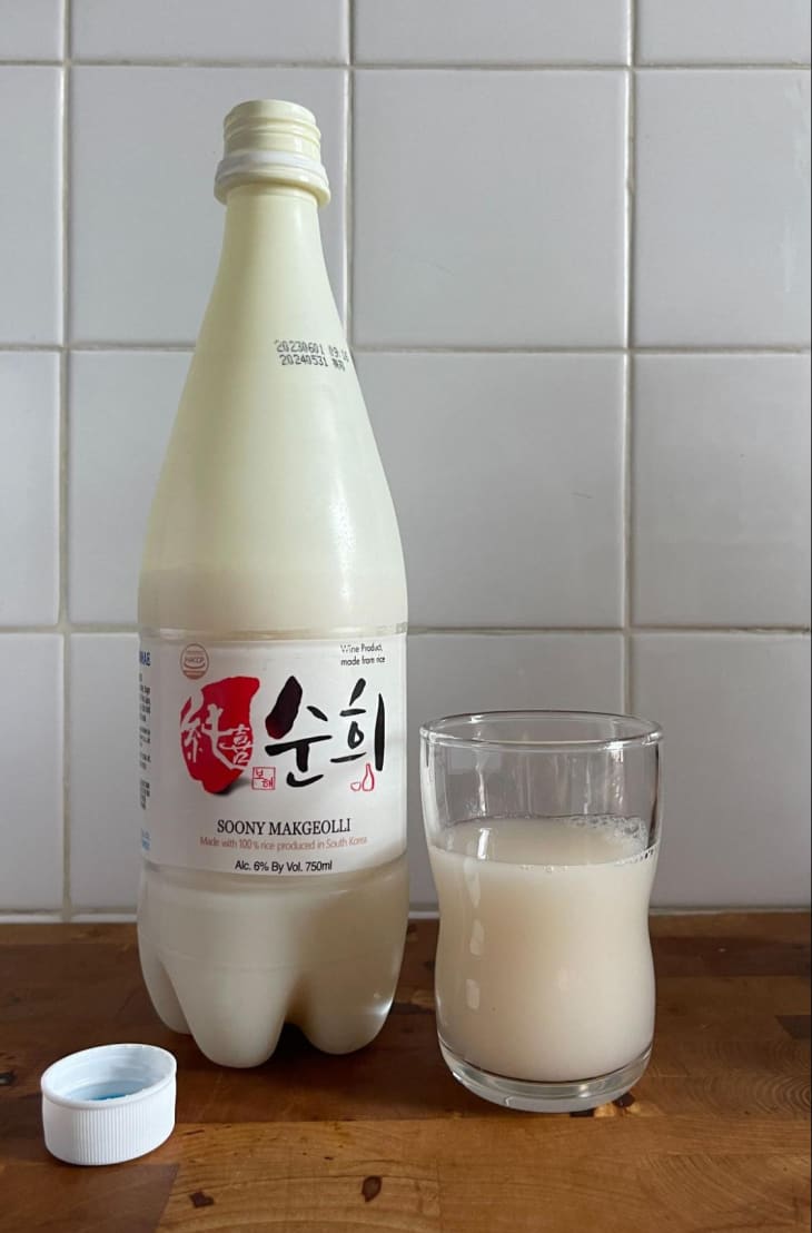 Bohae Soony Makgeolli bottle with some in glass