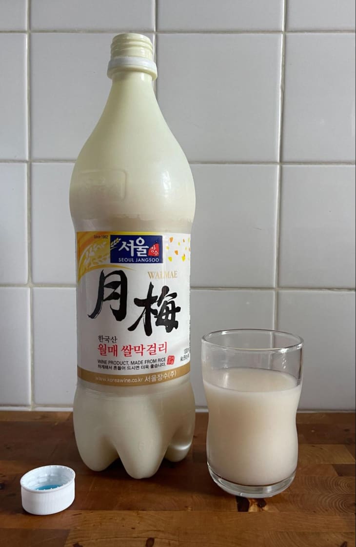 Walmae Rice Wine bottle with some in glass