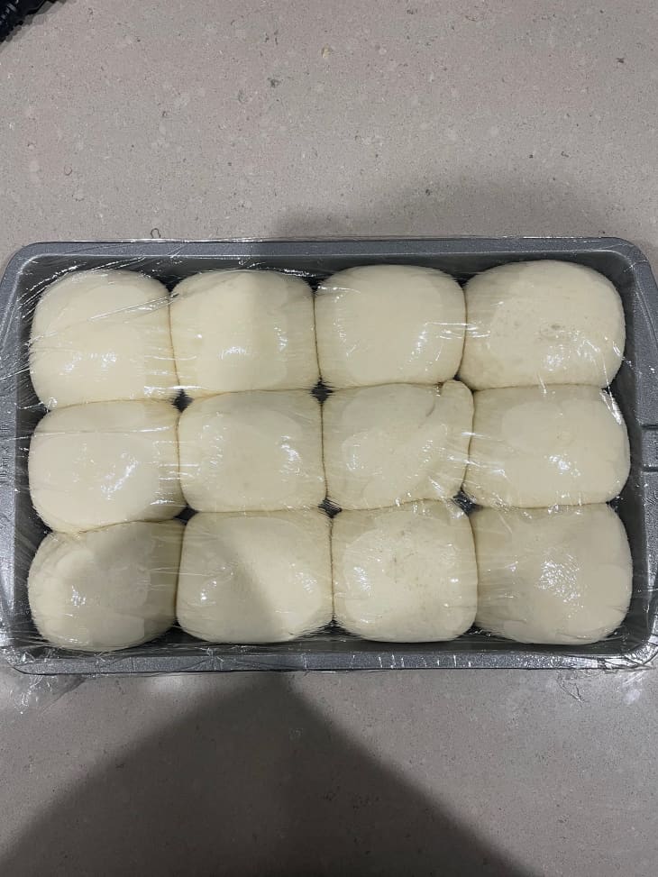 Focaccia dough rolled in baking sheet.