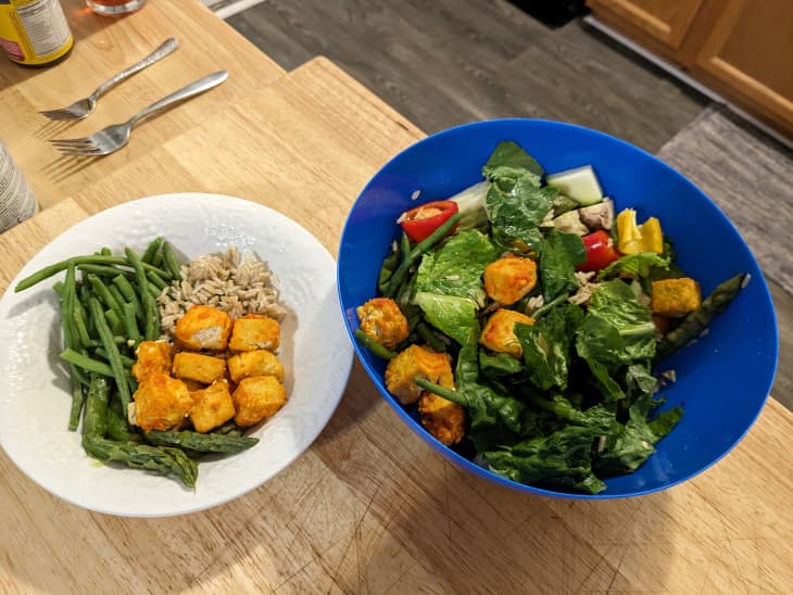 crispy tofu over salad in a bowl and also with veggies on plate