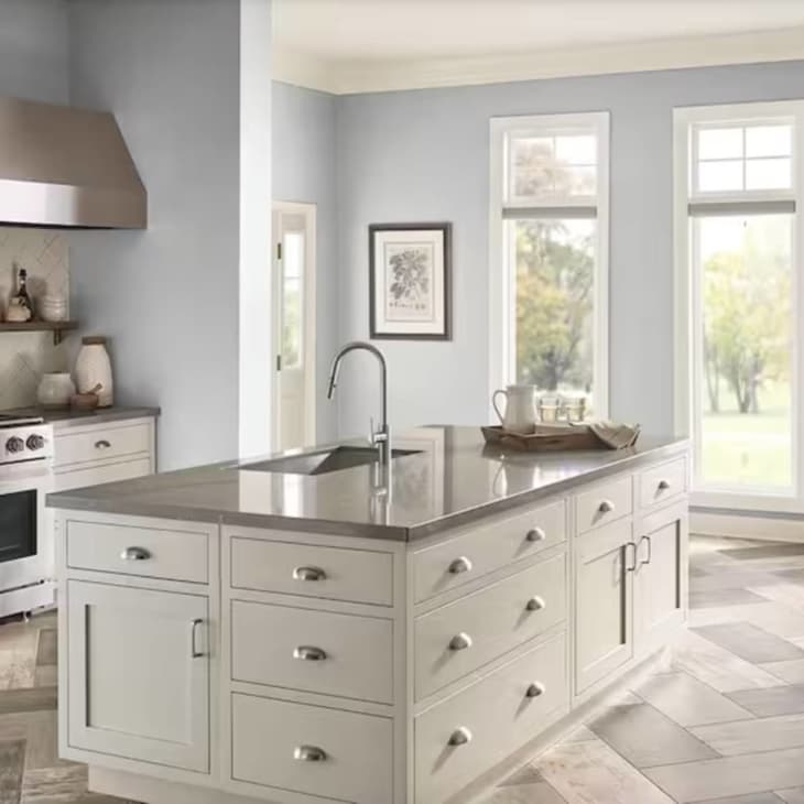 gray blue walls in kitchen with large middle island