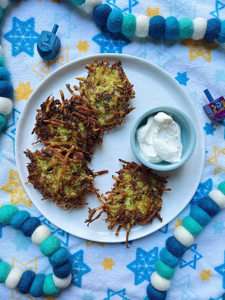 Brussels sprouts latkes on a plate.