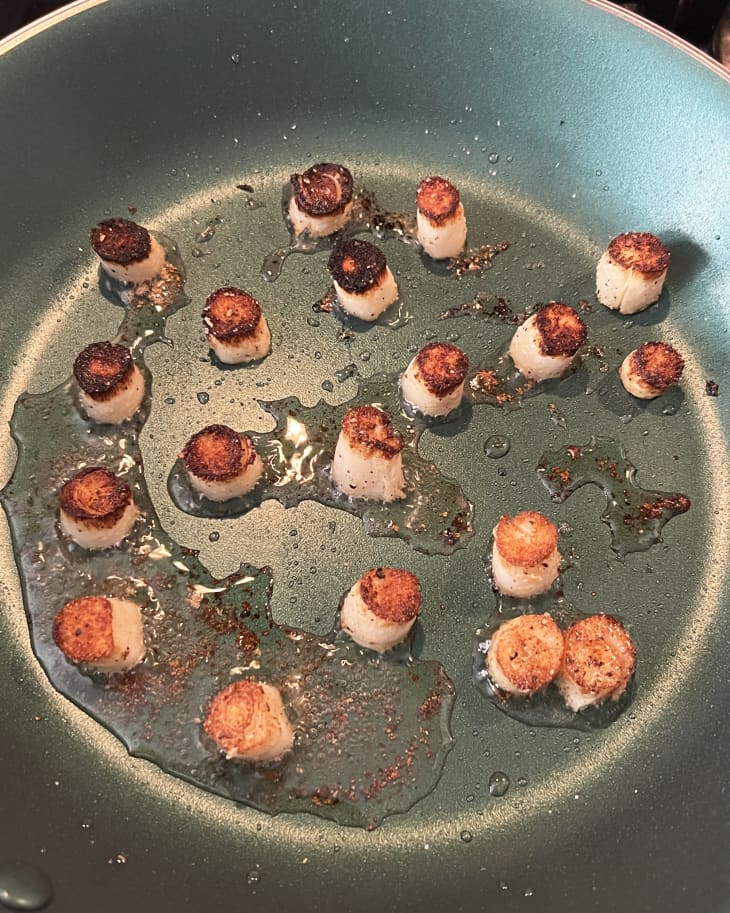 hearts of palm cooking in oil in pan like scallops