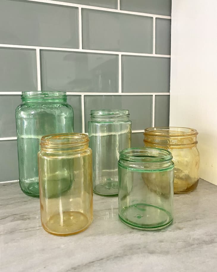 DIY vintage colored glass jars on counter