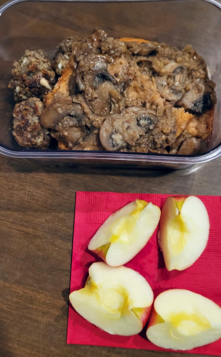 Mushroom gravy with bread and meatballs with apple slices