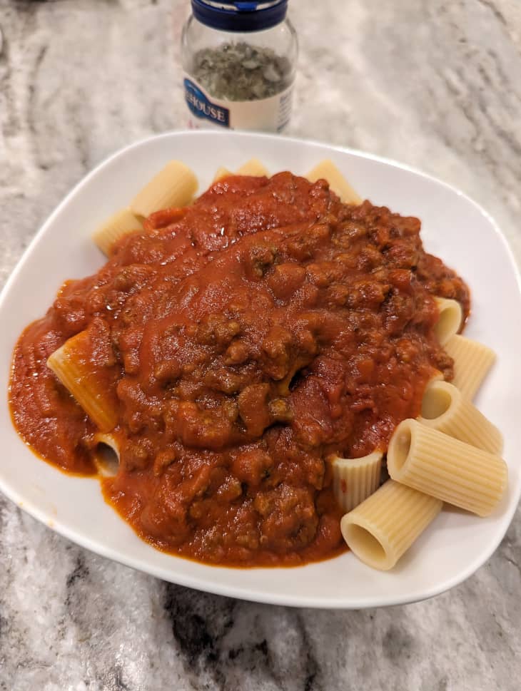 Pasta with tomato sauce on top.