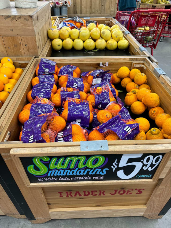Trader Joe's sumo mandarins in bin.