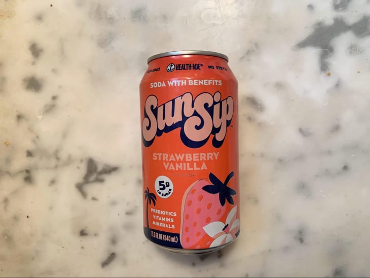 Health-Ade Strawberry Vanilla SunSip can on marble counter