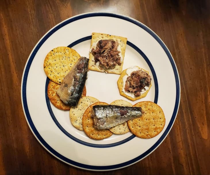Canned sardines on crackers.