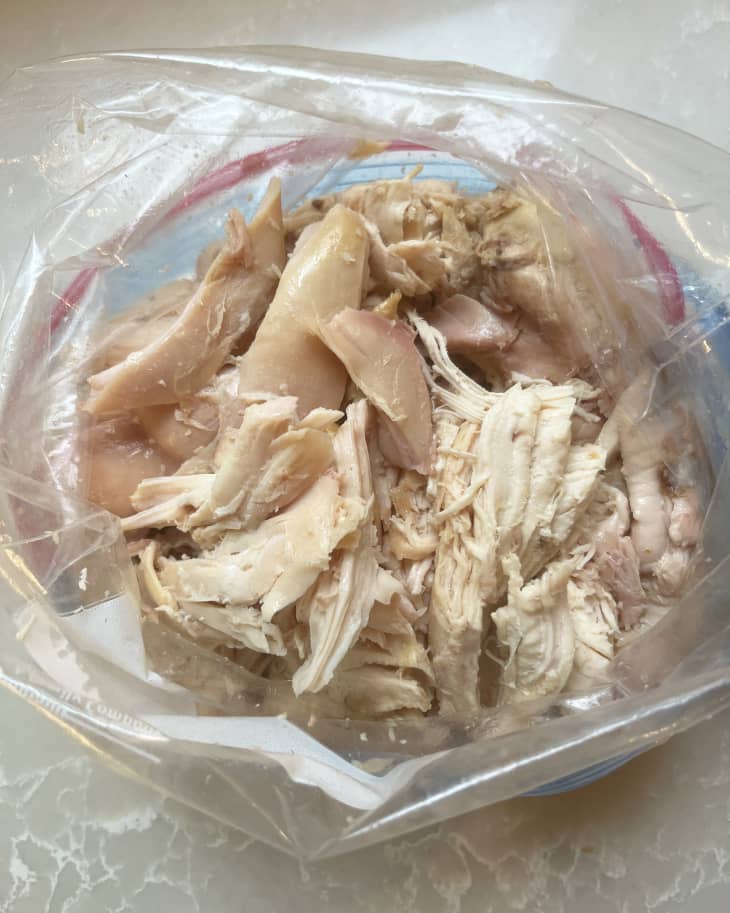 shredded chicken meat in a plastic bag