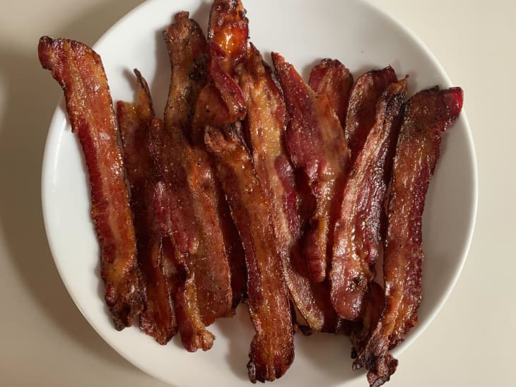 Glazed bacon on plate.