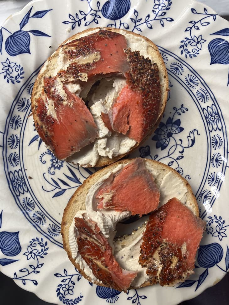 Smoked salmon on a bagel with cream cheese.