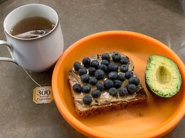 Saturday: Tulsi Ashwagandha tea and a slice of Dave’s Killer Bread topped with sun butter and blueberries, along with half an avocado.
