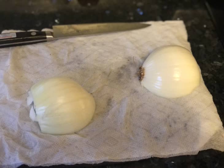 raw onions on damp paper towel