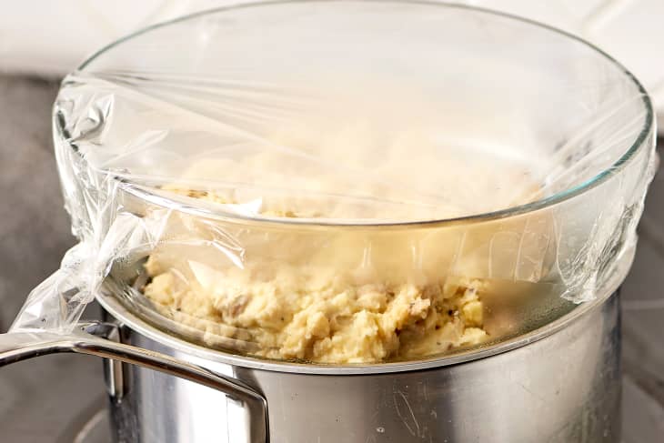 Mashed potatoes on stove top.