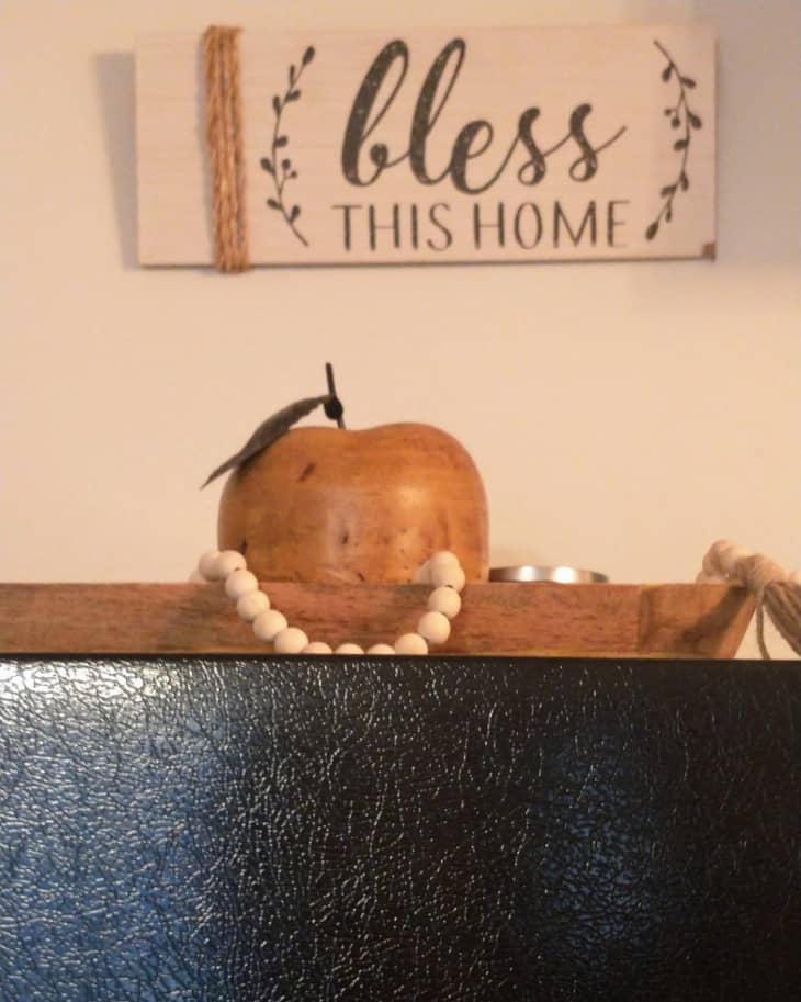 Huntington Home Rustic Carved Wood Candle in someone's home