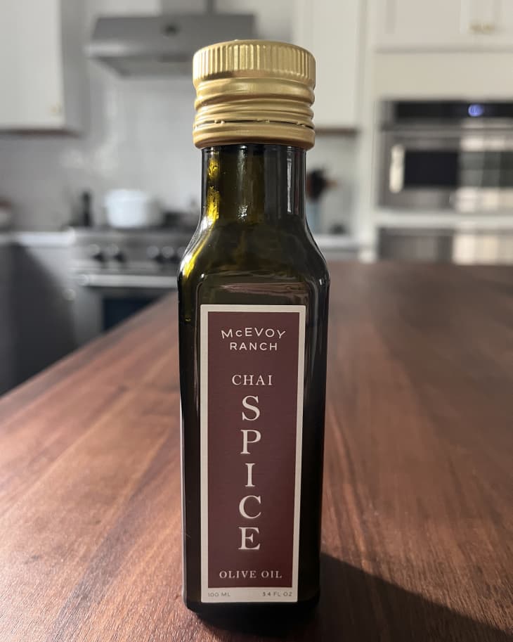 Bottle of McEvoy Chai Spice Olive Oil sitting on table