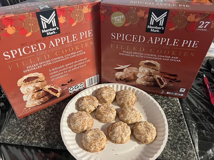 Sam's Club Member's Mark Spiced Apple Pie Filled Cookies on a plate in front of the box