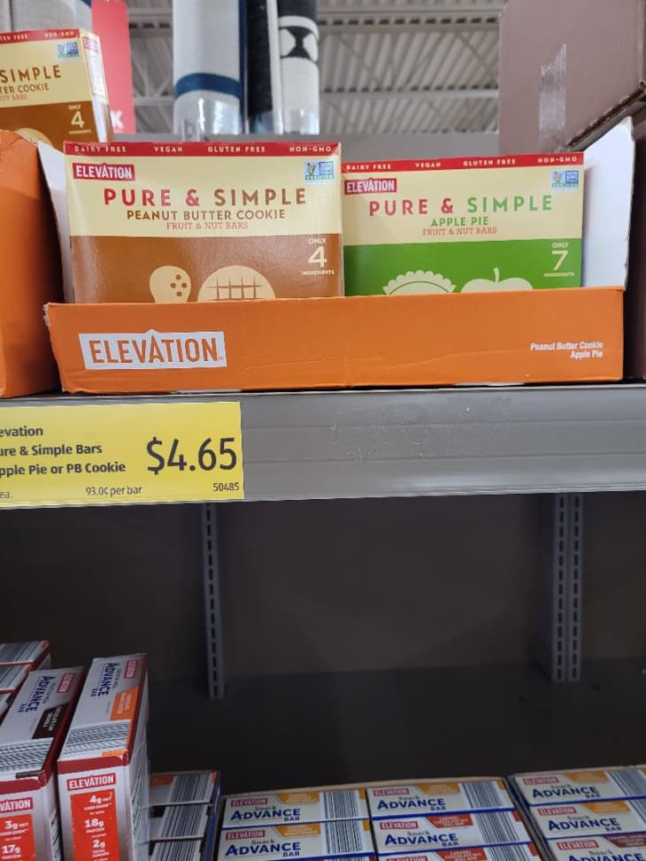 Boxes of Elevation Pure &amp; Simple bars on a shelf