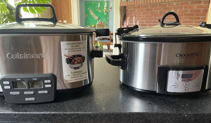 two slow cookers on countertop
