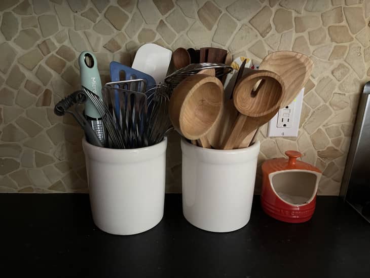two utensil crocks on countertop