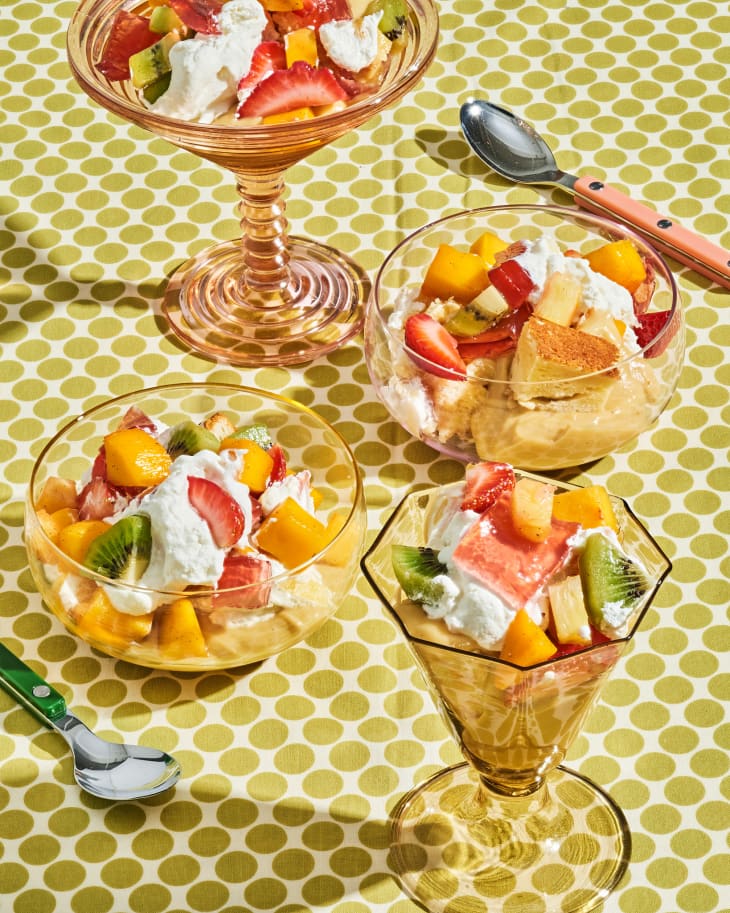 trifle in glasses and bowls on table