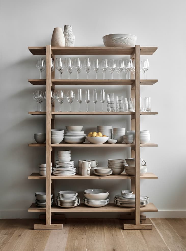Crate &amp; Barrel test kitchen with dishes on shelves