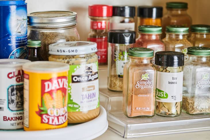 Spices and various cooking ingredients organized in pantry