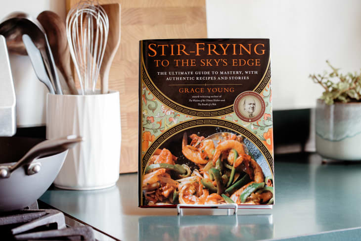 The cookbook "Stir-Frying to the Sky's Edge" on the kitchen counter