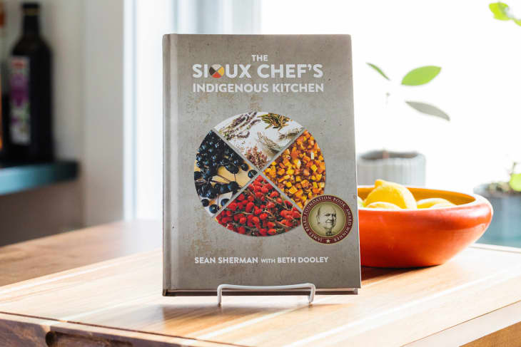 Sioux Chef's cookbook on a stand in the kitchen