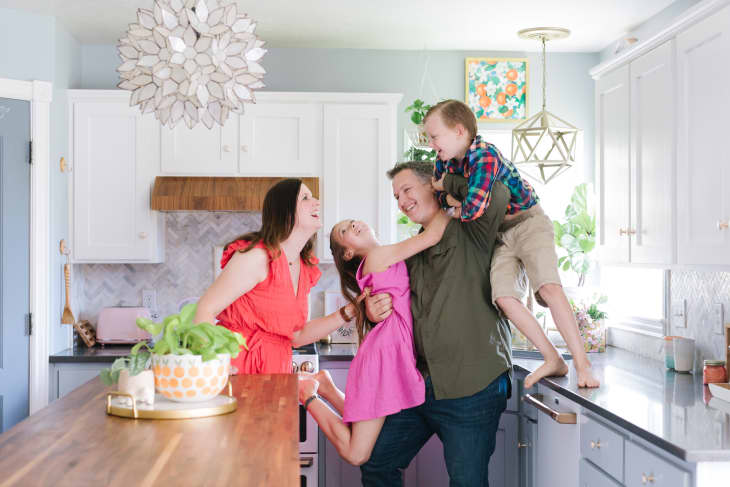 Laurel Harry and family in kitchen.
