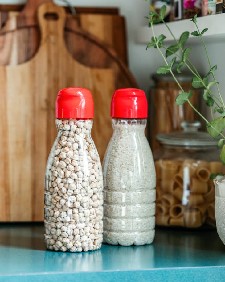 Used creamer containers filled with dried goods.