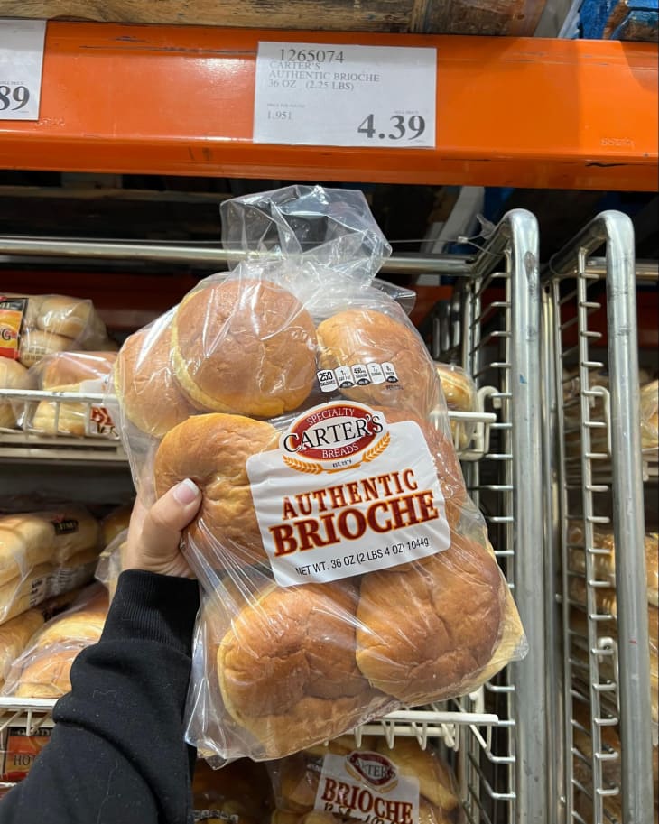 Someone holding up a package of Carter’s Specialty Breads Brioche in Costco store