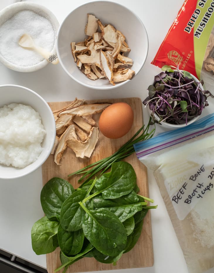 Ingredients for congee soup sit on the counter.
