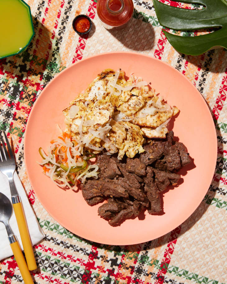 plate of beef tapa matzo brei with atchara.