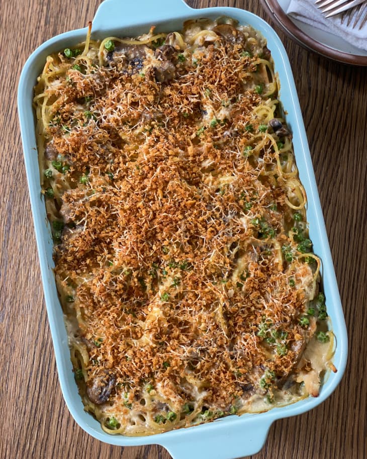 Chicken Tetrazzini (baked spaghetti with peas, chicken and mushroom in a creamy sauce) in a pan