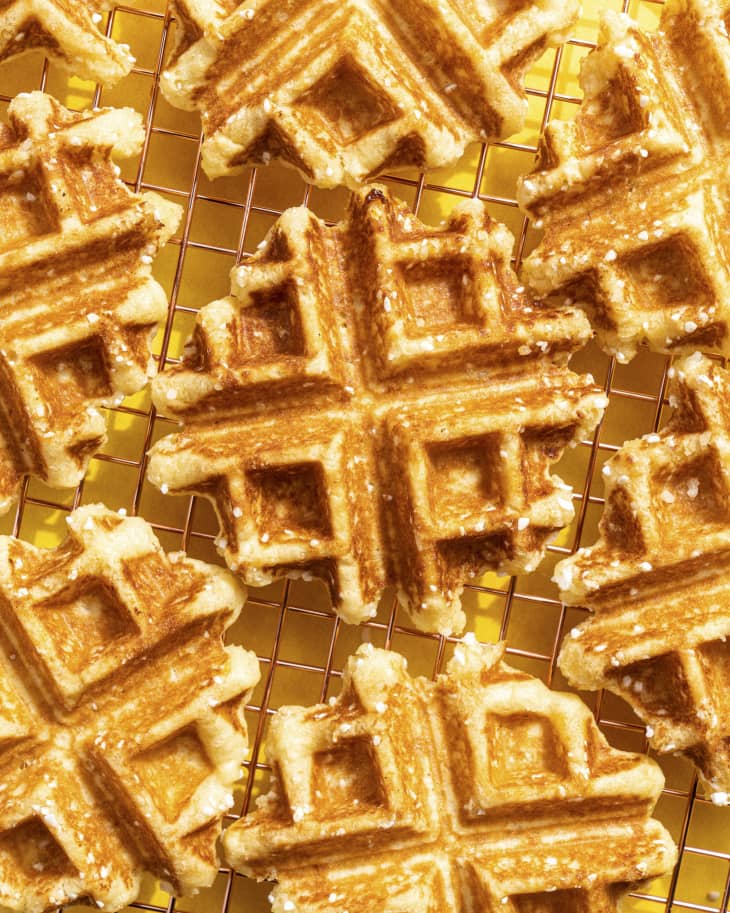 liege waffles (A Liège waffle is filled with unevenly distributed clusters of caramelized pearl sugar) on a cooling rack