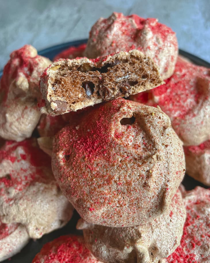 chocolate Meringue cookies with red powdered sugar