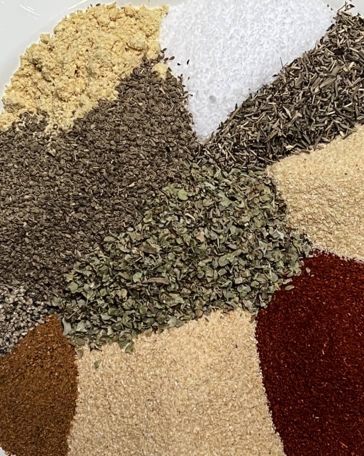 cajun seasoning separated individually by spices, creating a mosiac effect