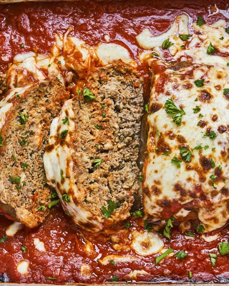 Italian meatloaf (sliced meatloaf in a marinara sauce with melted mozzarella cheese on top, similar to an italian baked pasta dish)