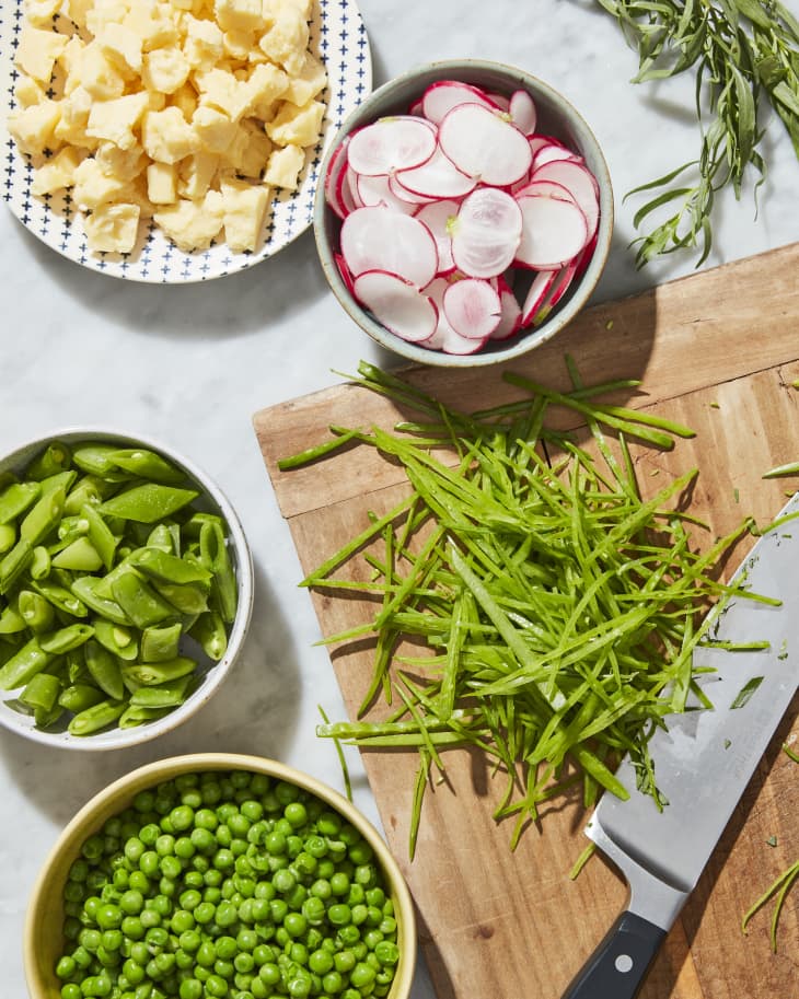 pea shoot salad ingredients on cutting board