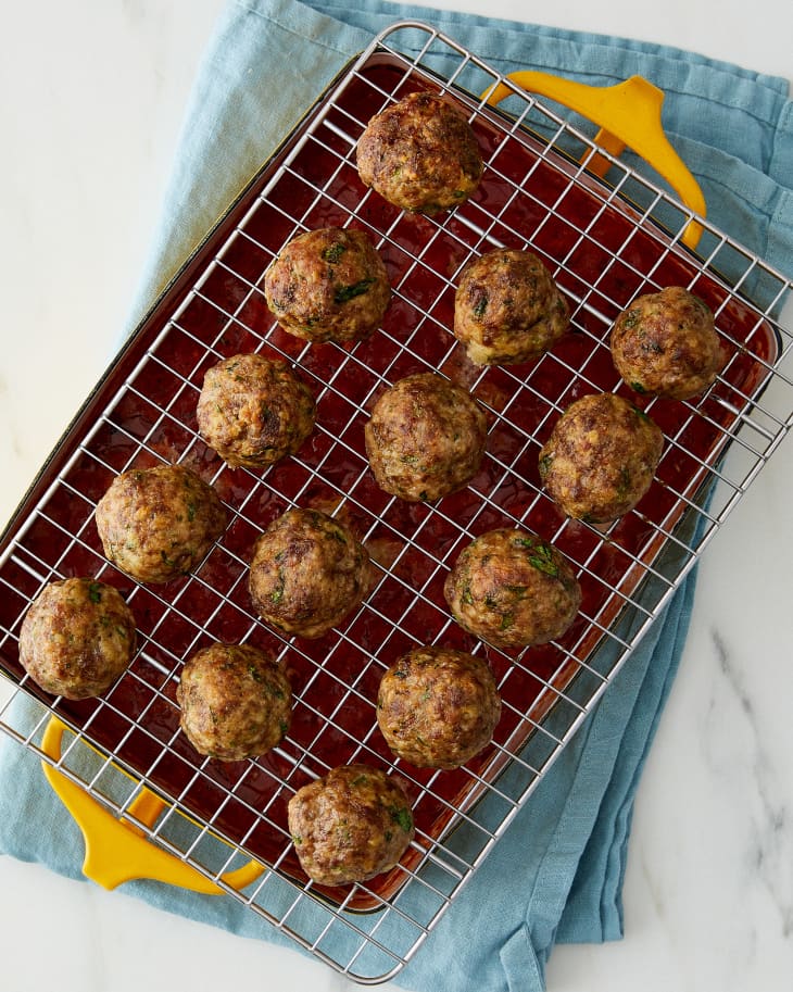 Easy oven baked meatball on wire rack.