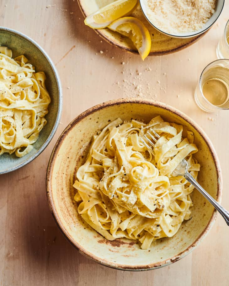 Pasta al limone in bowl with fork.