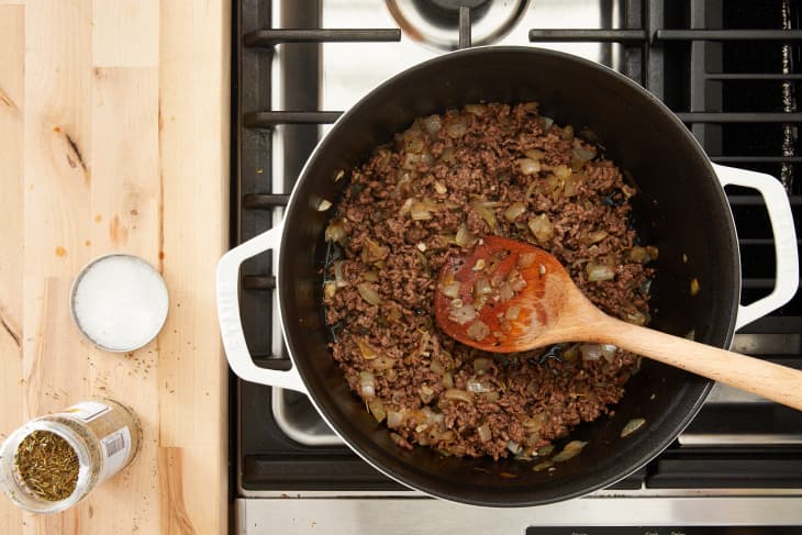 Ground beef cooking in large pot.