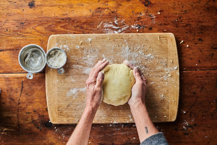 Hand shaping gnocchi dough.